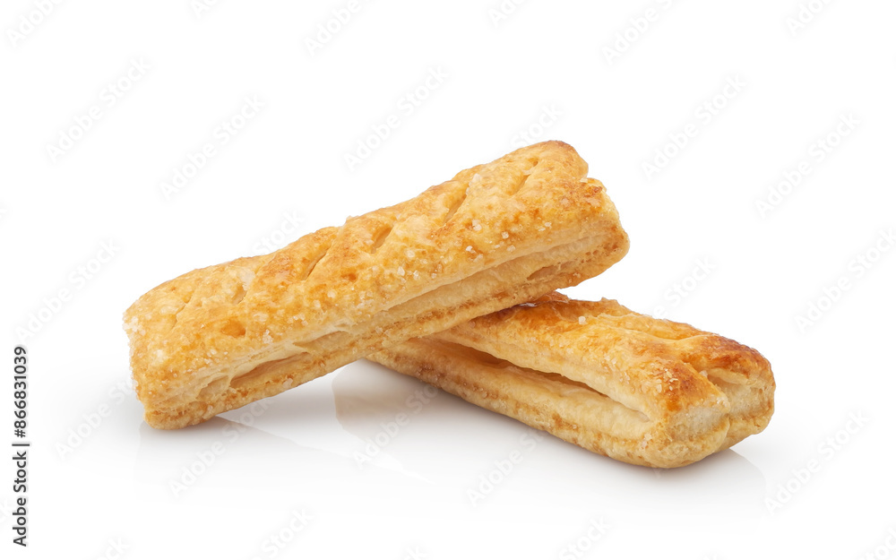 Crispy puff pastry sprinkled with sugar isolated on white background Crispy puff pastry sprinkled with sugar isolated on white background
