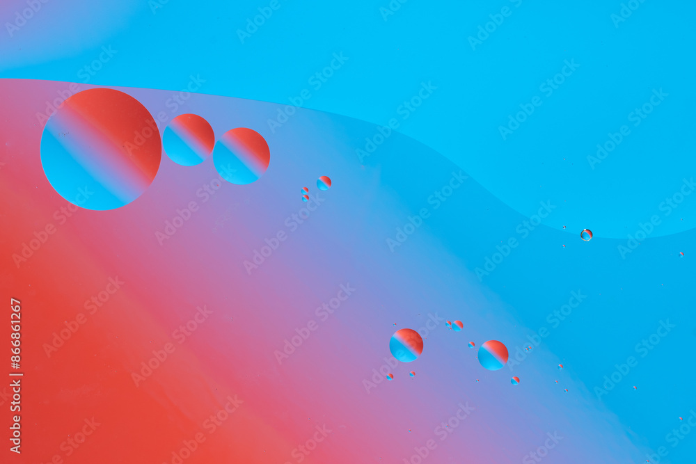 Colorful abstract background with dynamic bubble shapes. Red and blue gradient. Colorful abstract background with dynamic bubble shapes. Red and blue gradient.