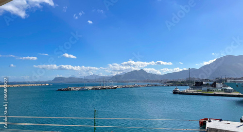 Viewing the sky, mountains and Mediterranean sea, from a cruise ship in Palermo, Sicily, Italy