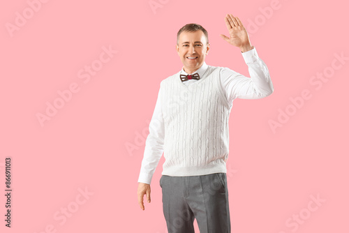 Mature man giving high-five...