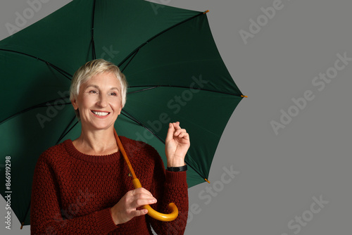 Beautiful mature woman poin...