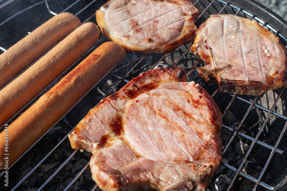 juicy delicious meat steaks and sausages fried on barbecue juicy delicious meat steaks and sausages fried on barbecue