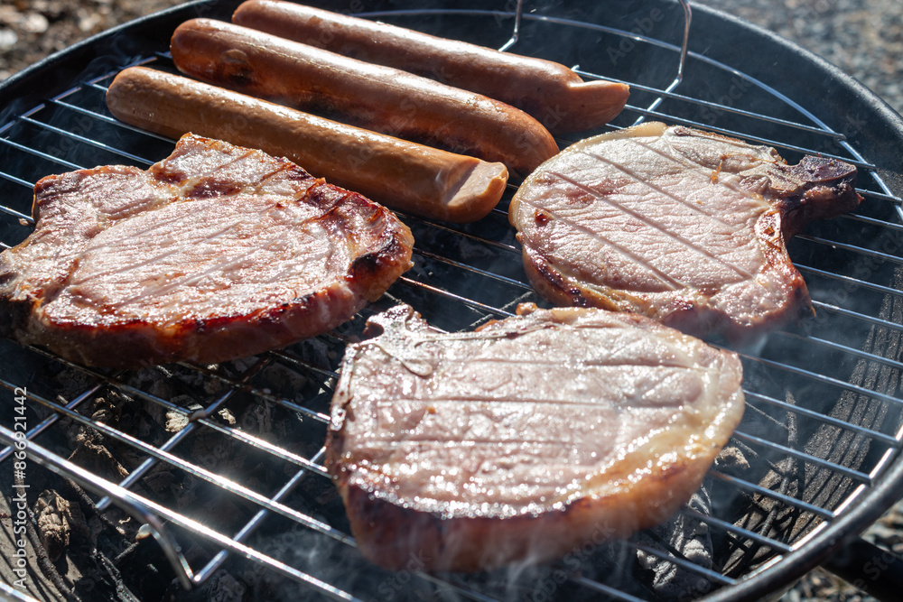 juicy delicious meat steaks and sausages fried on barbecue juicy delicious meat steaks and sausages fried on barbecue