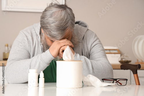 Portrait of sad senior man ...