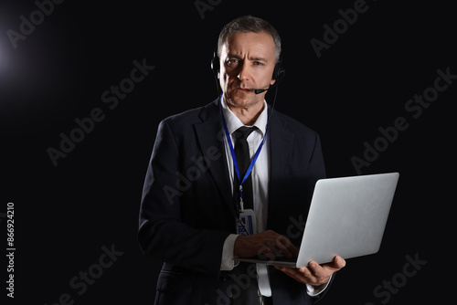 Mature FBI agent in headset...