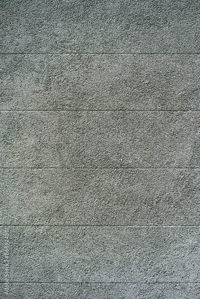 Photo of a gray concrete wall as background material Photo of a gray concrete wall as background material