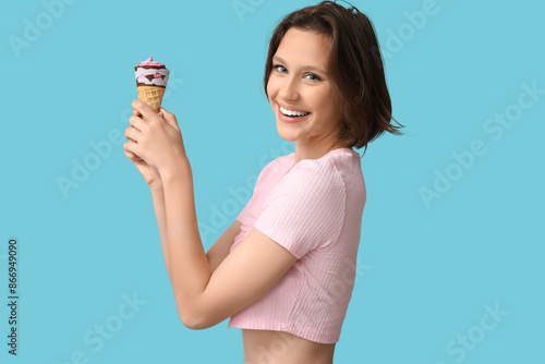 Happy young woman with swee...