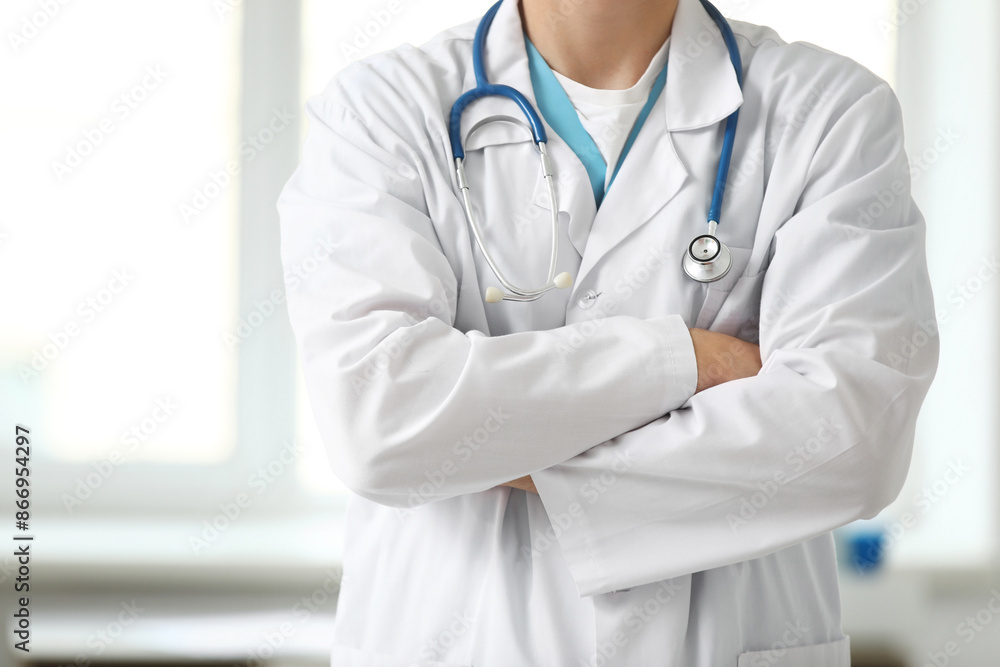 Young male doctor in clinic, closeup Young male doctor in clinic, closeup