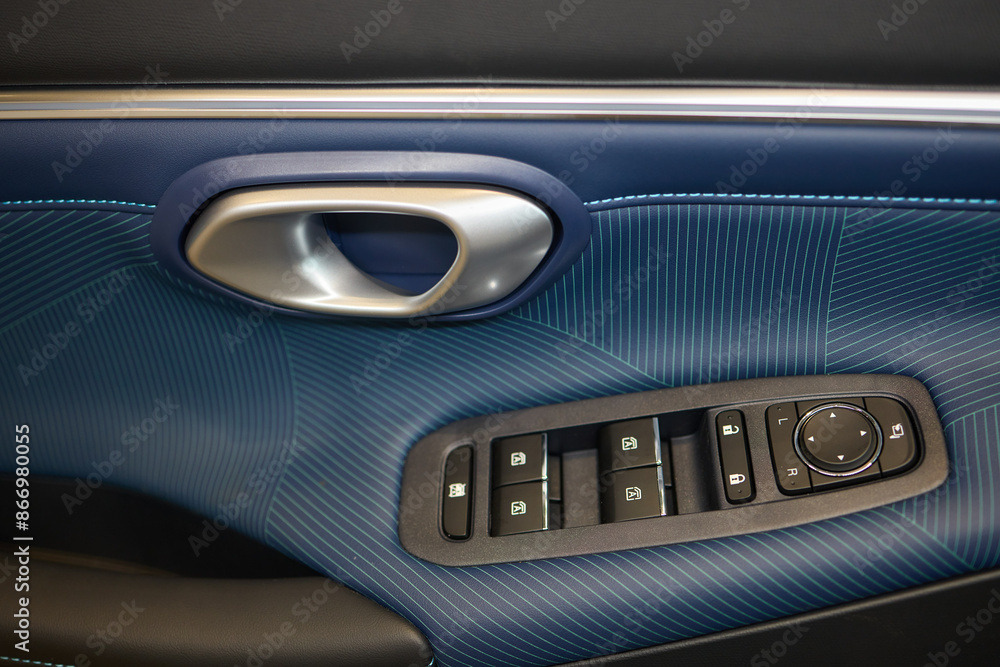 A car door with trim showcasing automotive design details A car door with trim showcasing automotive design details