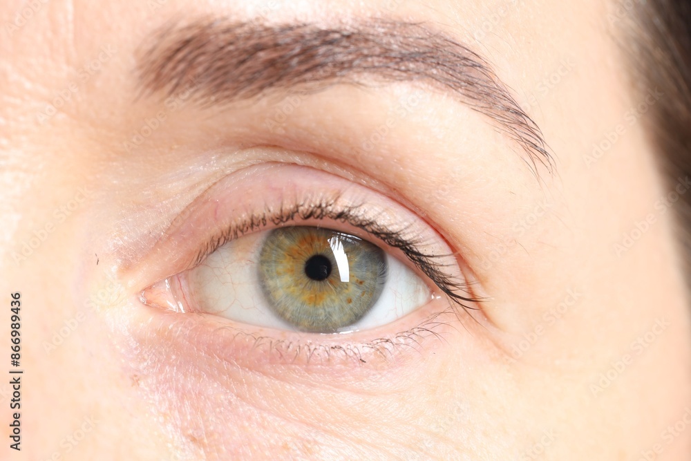 Woman with beautiful green eyes, macro photo Woman with beautiful green eyes, macro photo