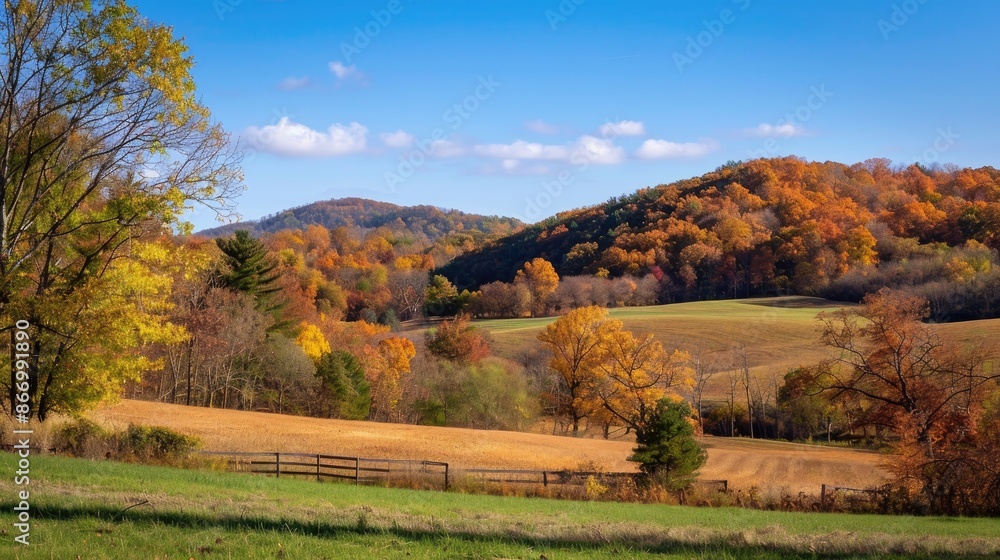 Trees and hills create a picturesque scene on a fall day Trees and hills create a picturesque scene on a fall day