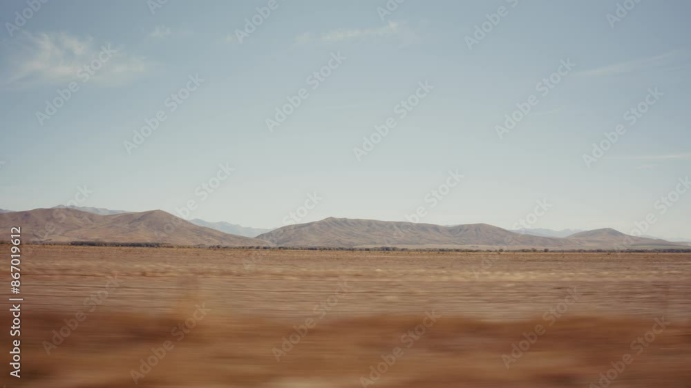 A New Zeland landscape viewed from a moving car A New Zeland landscape viewed from a moving car