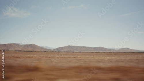 A New Zeland landscape viewed from a moving car 
