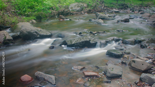 Elegant small waterfall in the woods