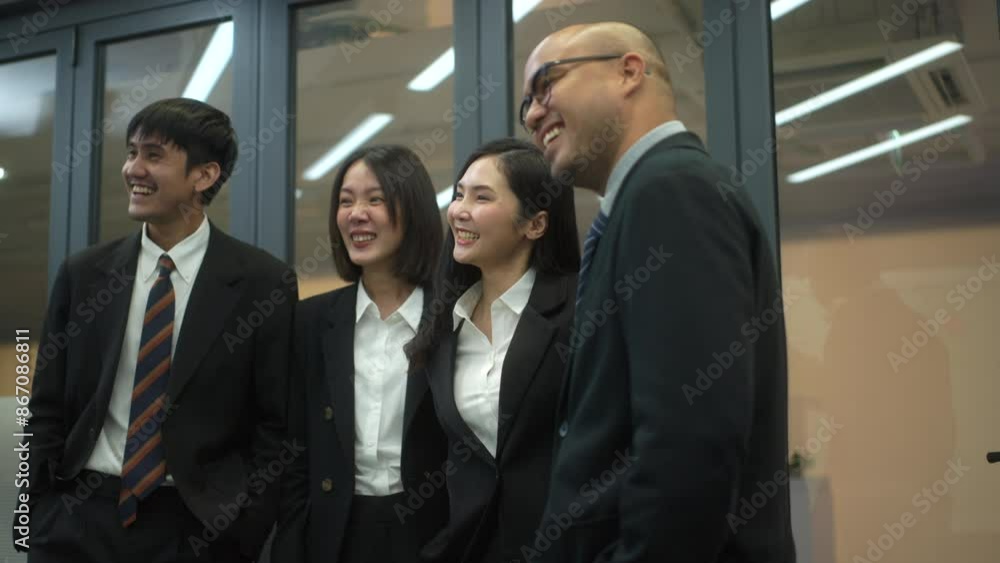 Happy diverse business people standing and talking in meeting room, friendly coworker smiling and having conversation in modern office, professional employee engagement at workplace.
Happy diverse business people standing and talking in meeting room, friendly coworker smiling and having conversation in modern office, professional employee engagement at workplace.