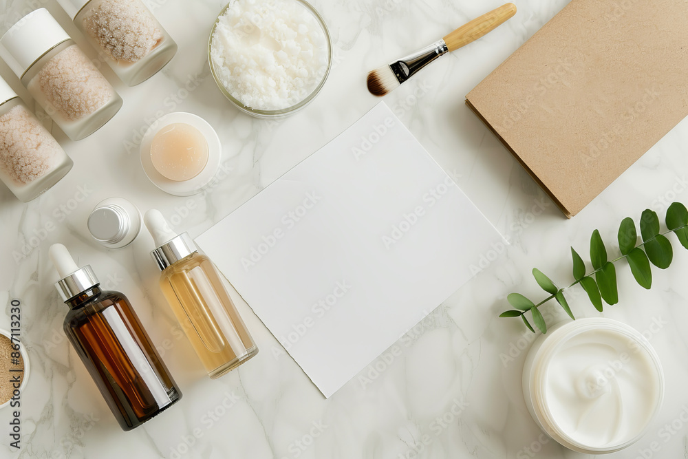 Natural skincare products and blank paper on a marble background. Flat lay composition with transparent and amber bottles, cream, and green leaves. Natural skincare products and blank paper on a marble background. Flat lay composition with transparent and amber bottles, cream, and green leaves.