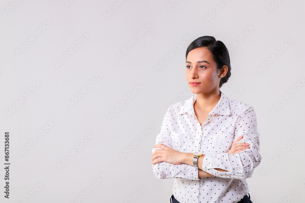 A Happy Business Woman Folding Her Hands And Looking Away A Happy Business Woman Folding Her Hands And Looking Away
