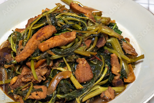 Adobong kangkong - a Filipino adobo dish with water spinach as the main ingredient.  photo