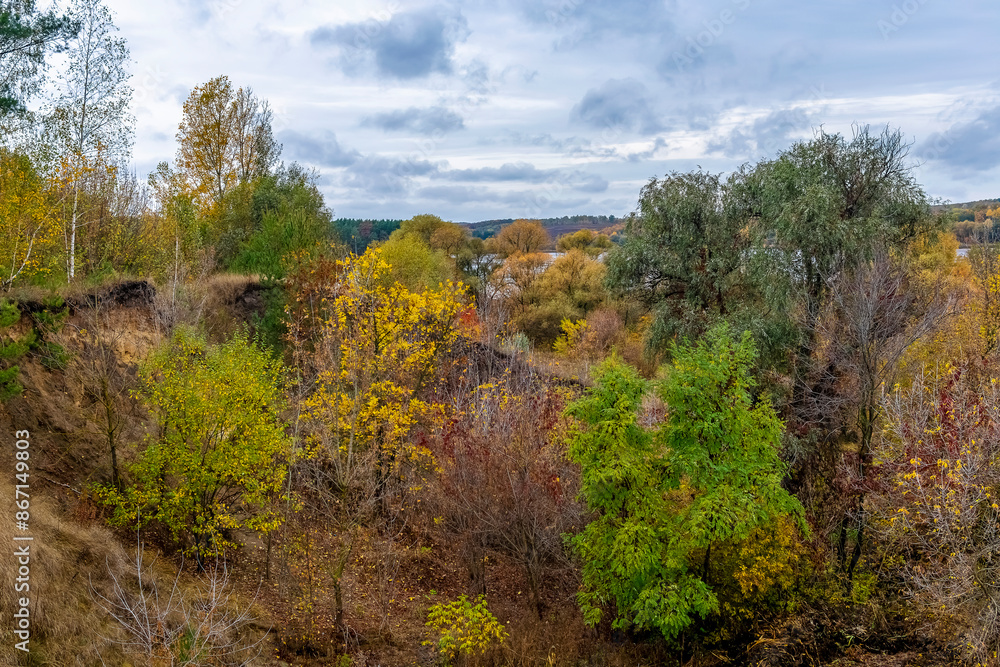 Bright autumn landscape with cloudy sky. Bright autumn landscape with cloudy sky.