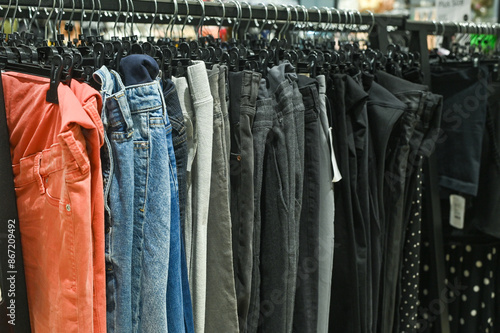 Wallpaper Mural pants on hangers in a store Torontodigital.ca