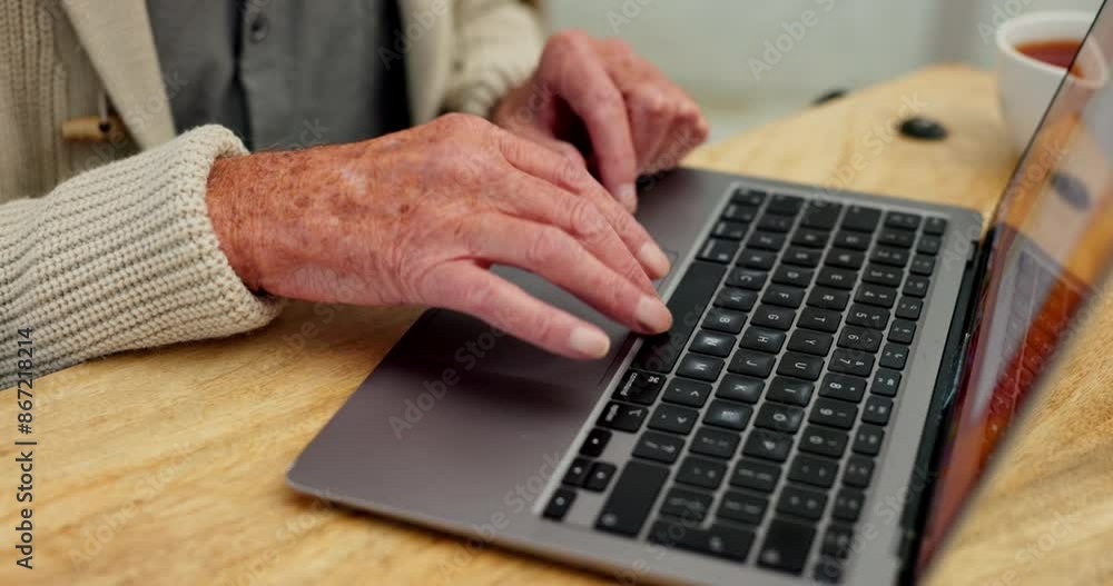Typing, laptop and hands of senior person at table for communication, online search or replying to email. Closeup, tech and pensioner for retirement, networking or post comment on website in home Typing, laptop and hands of senior person at table for communication, online search or replying to email. Closeup, tech and pensioner for retirement, networking or post comment on website in home