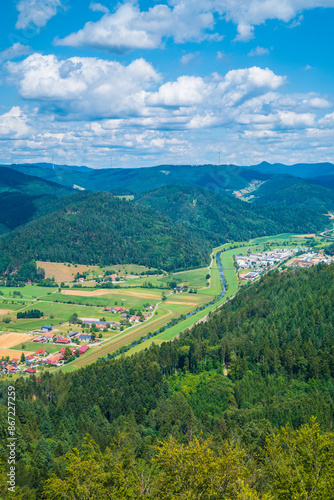 Obraz na płótnie Germany, Aerial nature scenery view above black forest tree tops, mountains, valleys near haslach im kinzigtal, kinzig river flowing through the valley w salonie