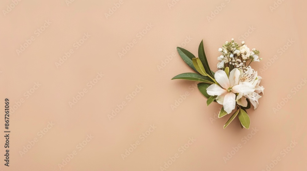 Chic boutonniere against a beige backdrop viewed from above Room for text Chic boutonniere against a beige backdrop viewed from above Room for text