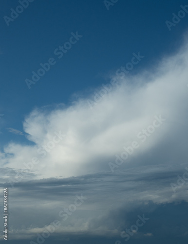 Blue sky. Beautiful Cumulus clouds flying across the sky, © Ulia Koltyrina