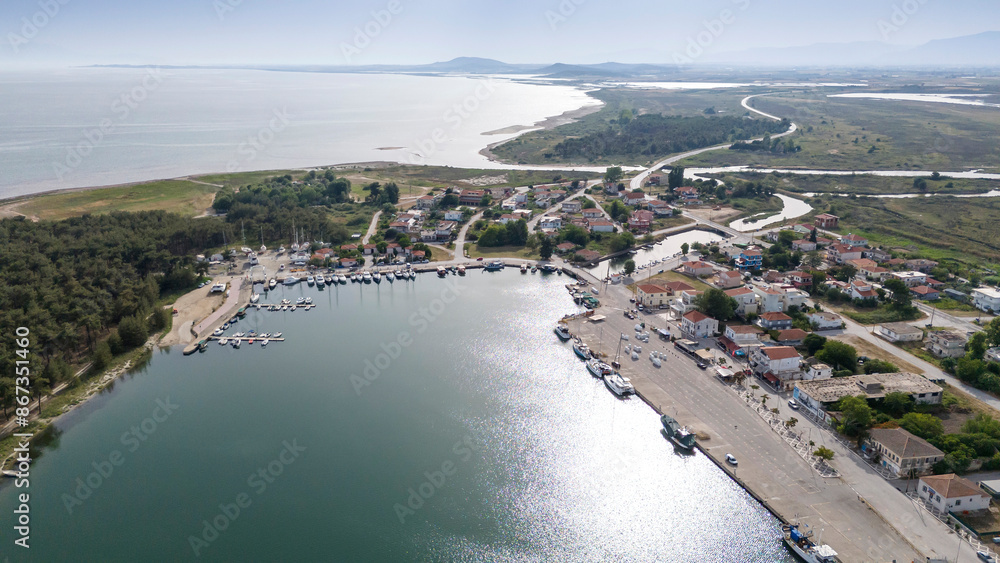 Obraz premium Aerial drone view od Agios Nikolaos Monastery on the Vistonida Lake at Porto Lagos, Greece