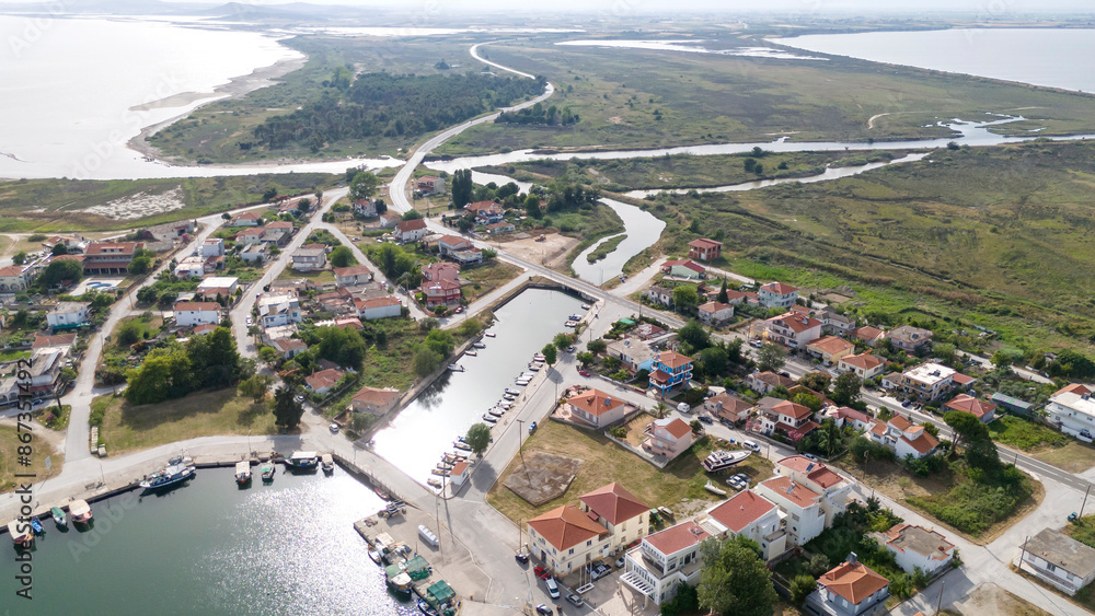 Obraz premium Aerial drone view od Agios Nikolaos Monastery on the Vistonida Lake at Porto Lagos, Greece