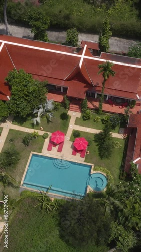 Aerial View of Luxurious Tropical Villa with Pool, Gardens, and Serene Surroundings