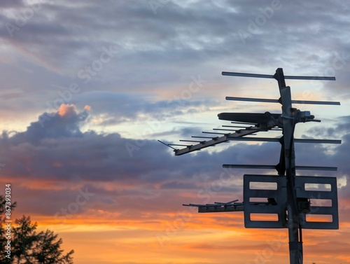 Terrestrial TV Arial Against a Cloudy Sky at sunset 