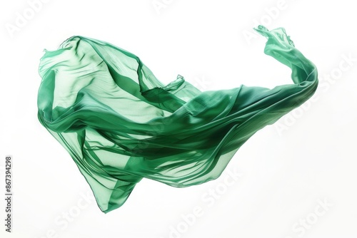 A green cloth floats freely in the air, its edges fluttering gently