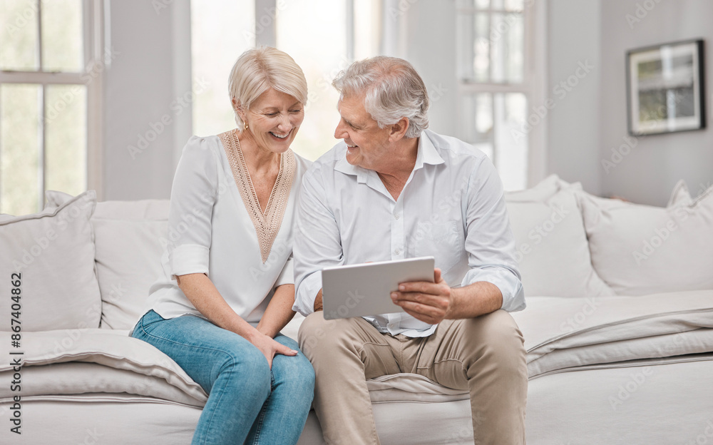 Senior couple, happy and tablet on sofa for planning retirement, love relationship and social network in home. Smile, mature woman and man with tech for pension website, online movie and bonding Senior couple, happy and tablet on sofa for planning retirement, love relationship and social network in home. Smile, mature woman and man with tech for pension website, online movie and bonding