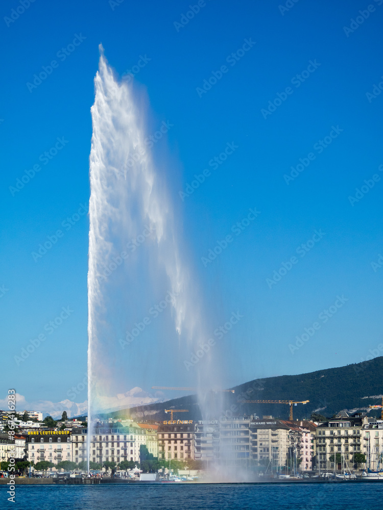 Rainbow by the water jet on lake Geneva
