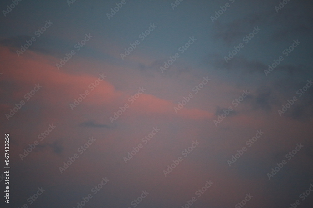 beautiful cloudy sunset creating pink and orange clouds. beautiful cloudy sunset creating pink and orange clouds.