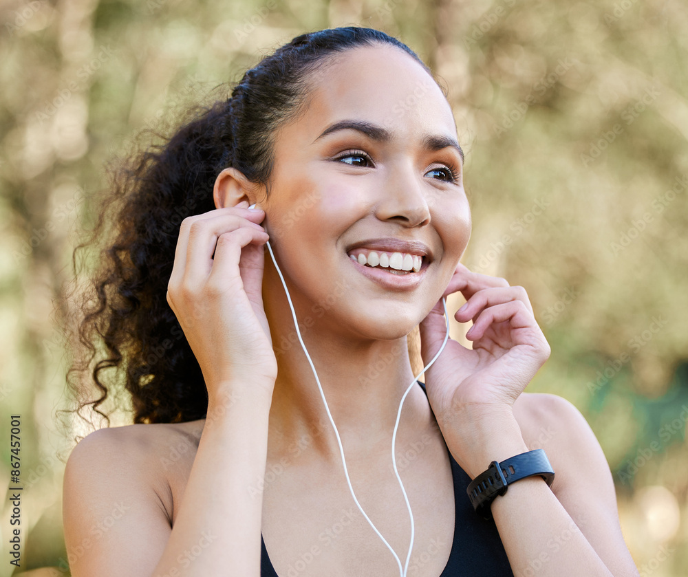 Woman, music and earphones in nature for exercise, training and fitness for cardio and body health. Audio, guided run and mobile app for virtual personal trainer, female person and athlete in park Woman, music and earphones in nature for exercise, training and fitness for cardio and body health. Audio, guided run and mobile app for virtual personal trainer, female person and athlete in park