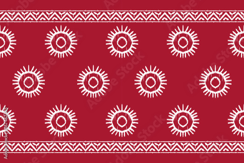 Motif ethnic beautiful sun Ikat art. Ethnic Africa saree fabric seamless pattern on background art. folk embroidery, Peruvian, Indian, Asia, Moroccan, Turkey, and Uzbek style. Aztec geometric art.