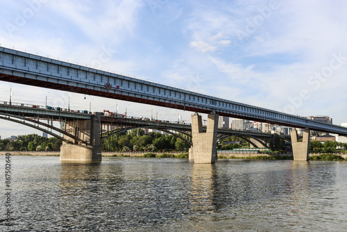 Novosibirsk, Novosibirsk region, Russian Federation - June 01 2024. Novosibirsk metro bridge and Oktyabrsky bridge