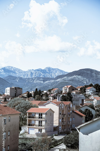 Travel, landscape of the Bay of Kotor against the backdrop of the Kotor mountains at sunset,