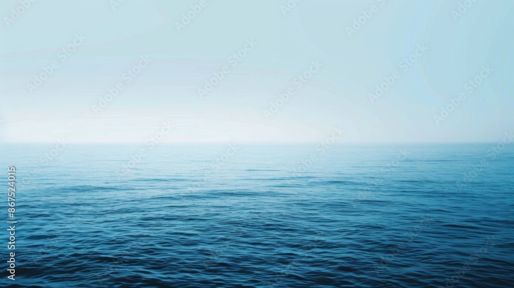 The image features a tranquil ocean with gentle waves under a serene blue sky, offering a peaceful view of the distant horizon with a sense of infinite calmness. The image features a tranquil ocean with gentle waves under a serene blue sky, offering a peaceful view of the distant horizon with a sense of infinite calmness.