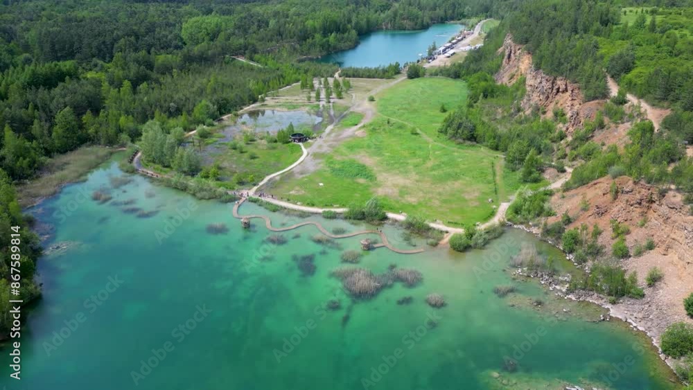Aerial view of the Gródek Park, Poland. Old mine, turquoise water. May 2024 Aerial view of the Gródek Park, Poland. Old mine, turquoise water. May 2024