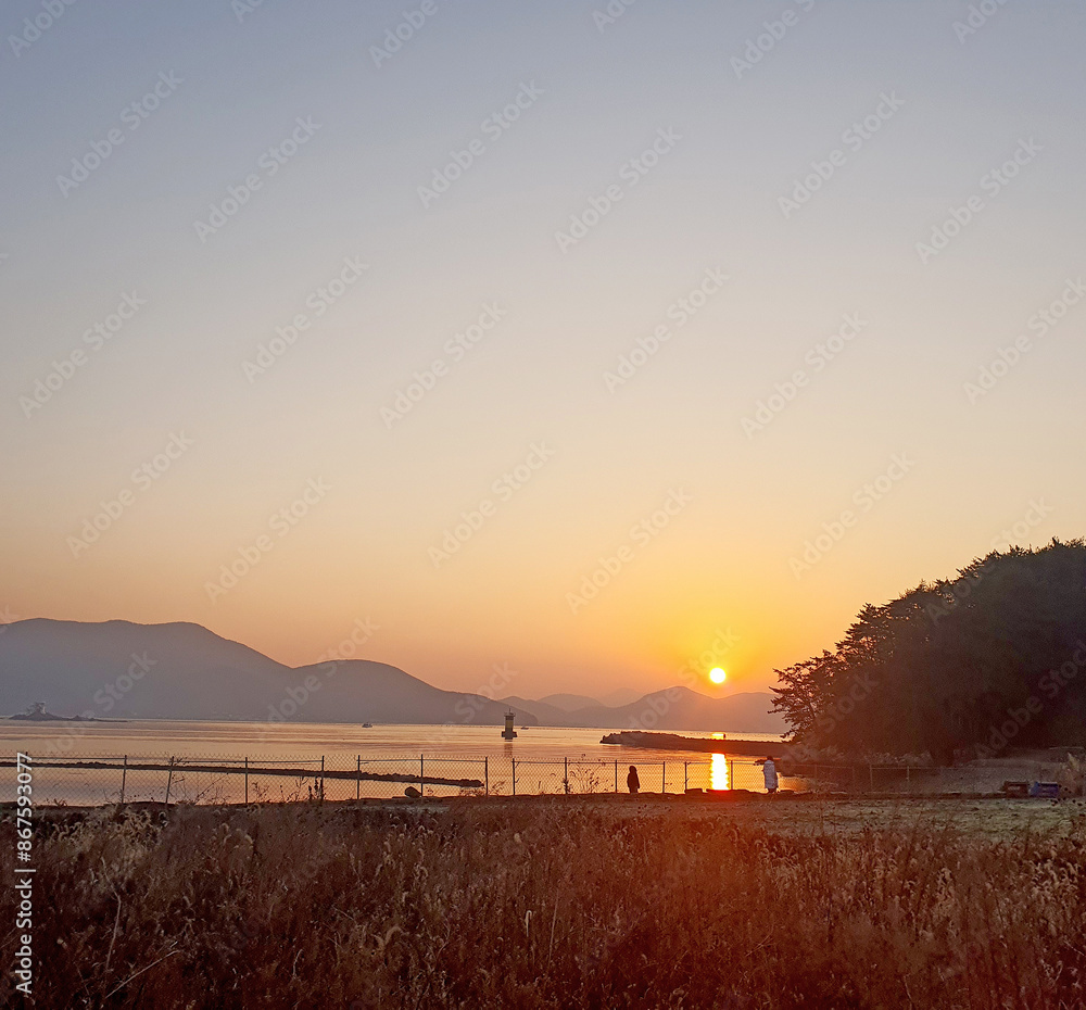 a sunrise from the beach