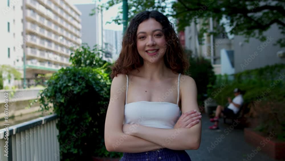 Young Brazilian woman in the city street, portrait of Brazilian girl smiling, emotional, positive headshot Young Brazilian woman in the city street, portrait of Brazilian girl smiling, emotional, positive headshot