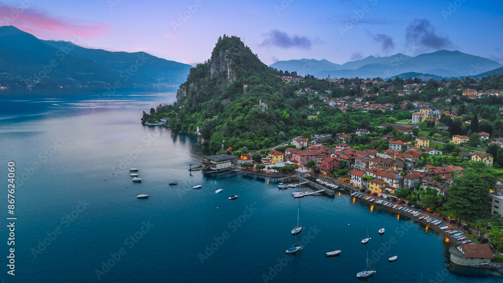 Aerial view of Rocca of Calde and Lake Maggiore in background during sunset, in the summer day, Castelveccana, Italy Aerial view of Rocca of Calde and Lake Maggiore in background during sunset, in the summer day, Castelveccana, Italy