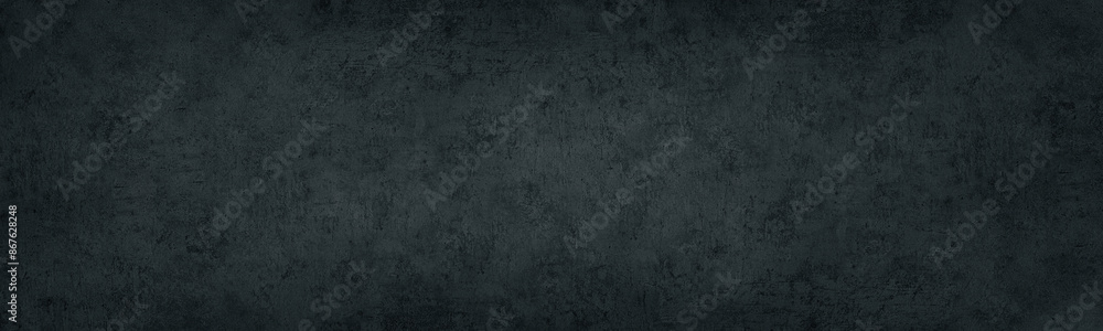 Fototapeta premium Black concrete wall. Dark old shabby rough cement panoramic distressed texture. Gloomy grunge textured long banner background