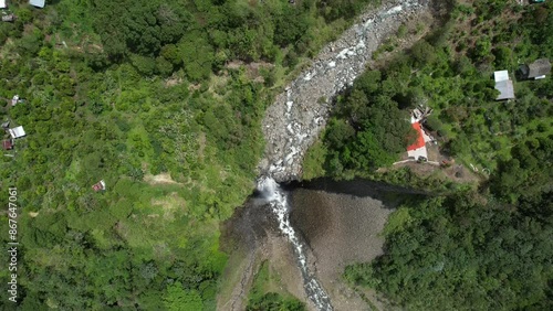 Aerial view of a waterfall on the Cascade Trail in Banos, Ecuador