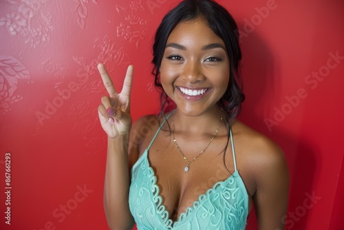 Peace Woman Smiling in Turquoise Dress with Cheerful Expression, Vibrant Colorful Background