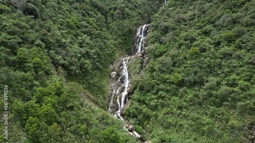 Aerial view of a waterfall on the Cascade Trail in Banos, Ecuador