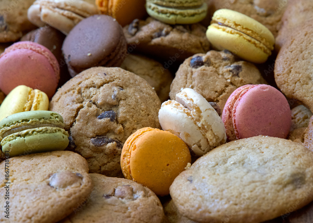 Close up on tray of assorted cookies, macarons and chocolate chip. Close up on tray of assorted cookies, macarons and chocolate chip.